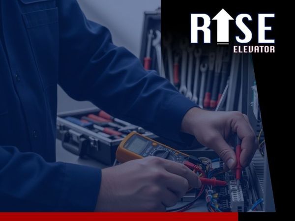 image showing a technician working on an elevator's control panel.