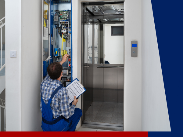 man servicing an elevator. 