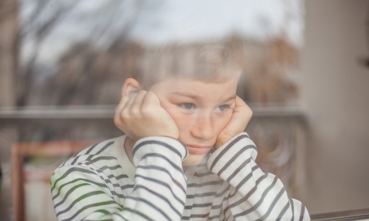 sad child at window.jpg
