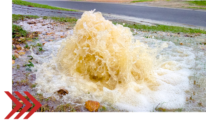 a burst sewer spewing water
