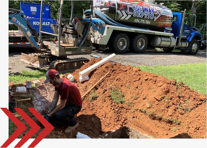 One Way Septic team working on a sewer line.