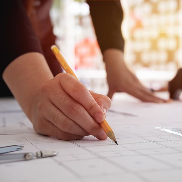 pencil on blueprints about us1.jpg