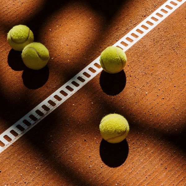 tennis balls on court products1.jpg