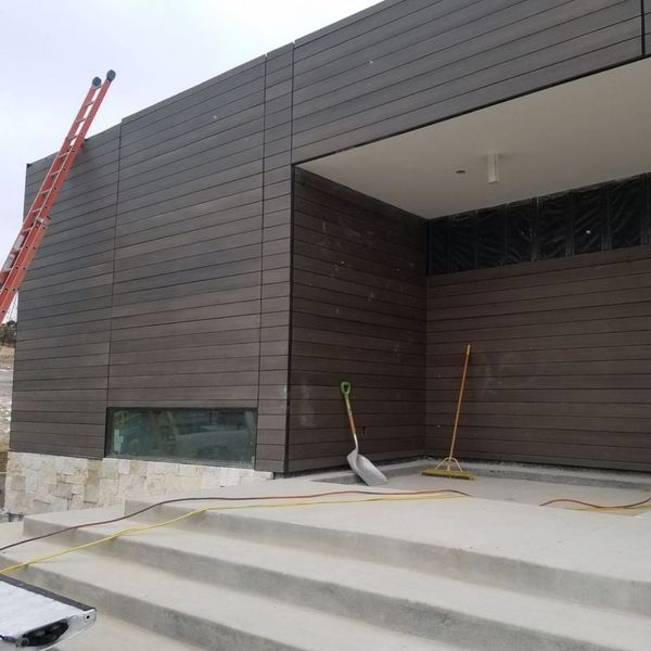 New siding being installed