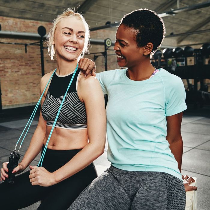 Roommates taking a break during a workout