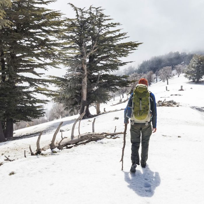 person hiking in snow