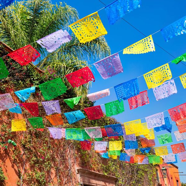 Papel picado hanging in the streets of Mexico. 