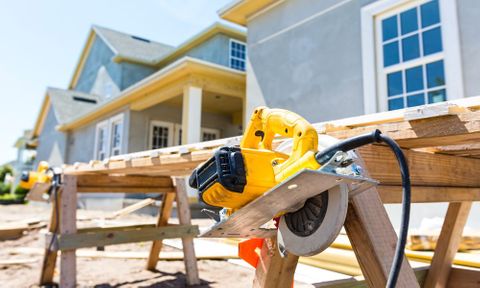 image of wood and saw for construction