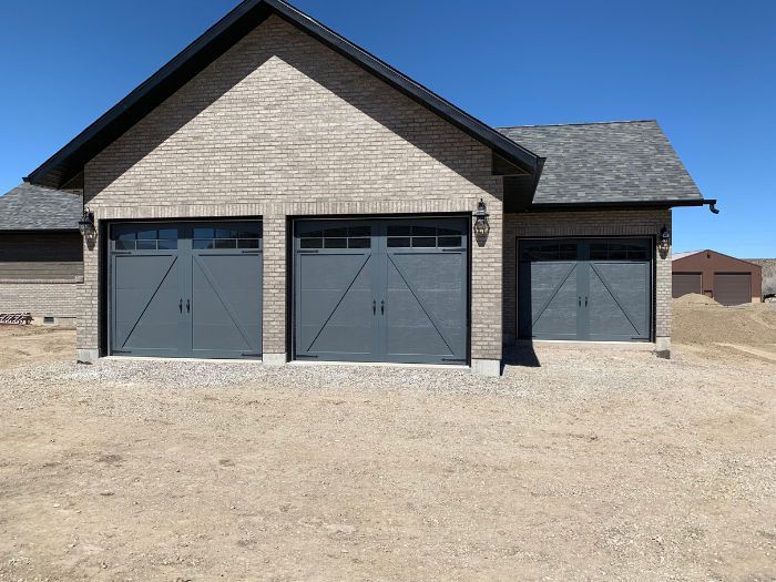 New garage doors on a home. 