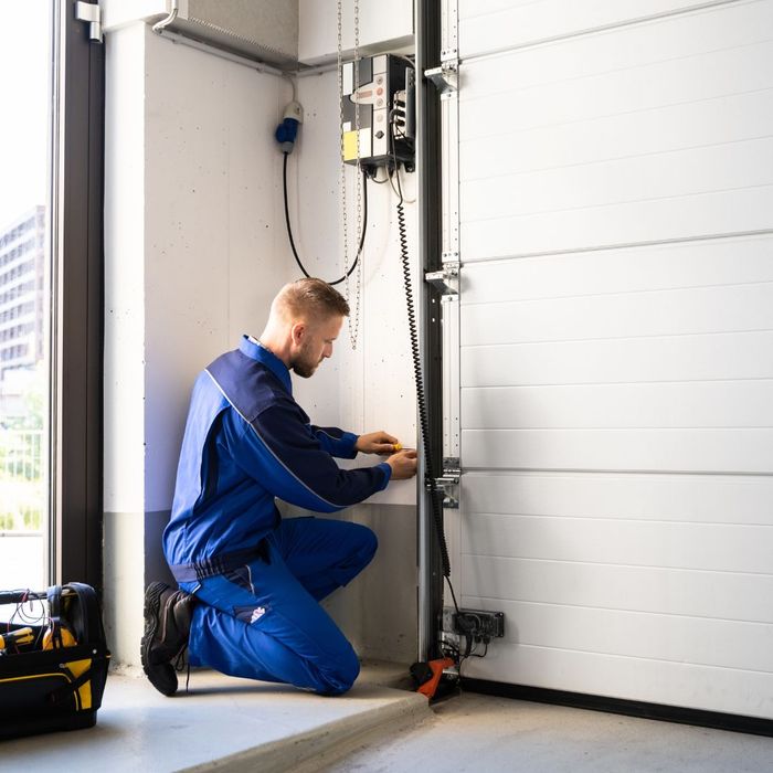 repairman fixing garage