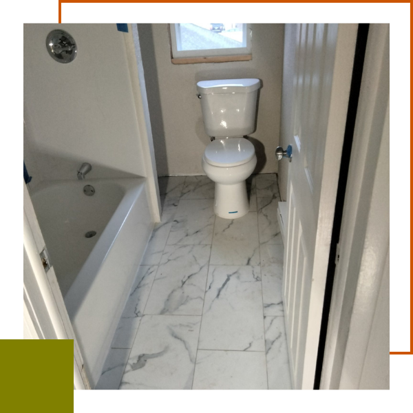 modern bathroom remodel with marble tile floors