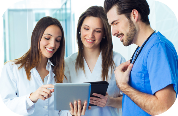 Group of nurses looking at tablet