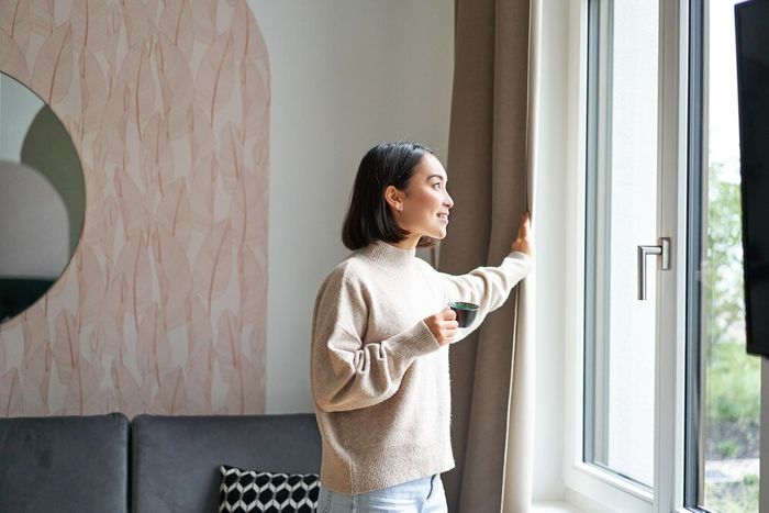 morning-happy-asian-woman-drinking-espresso-home-looking-outside-window-smiling-standing-c_1258-131942.jpeg
