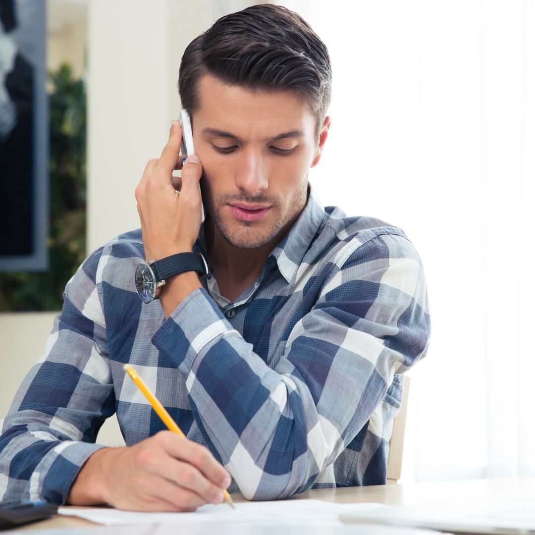 man speaking on the phone