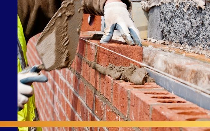 laying bricks down