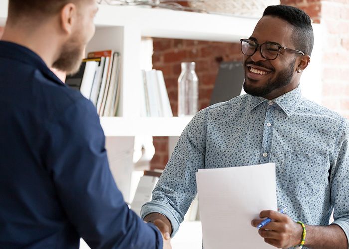 small business owner shaking hands