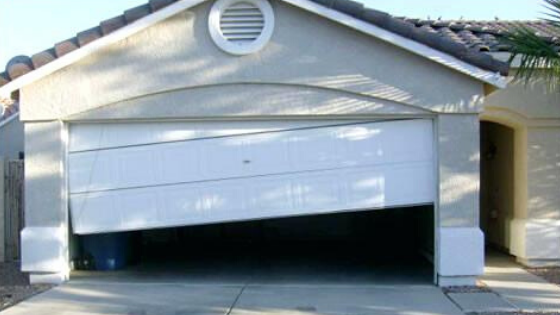 Garage Door Track Is Bent, Garage Door Off Track Repair Cost