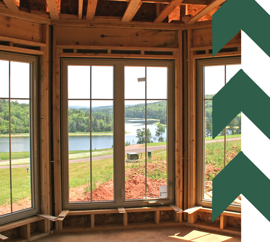 A room being remodeled with big windows