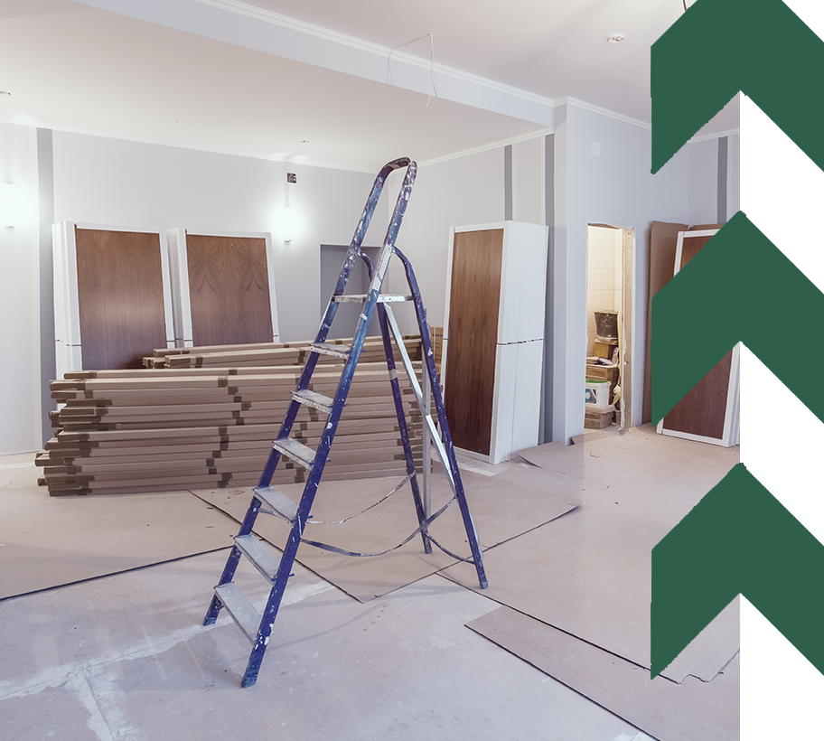 A room being renovated with lumber supplies