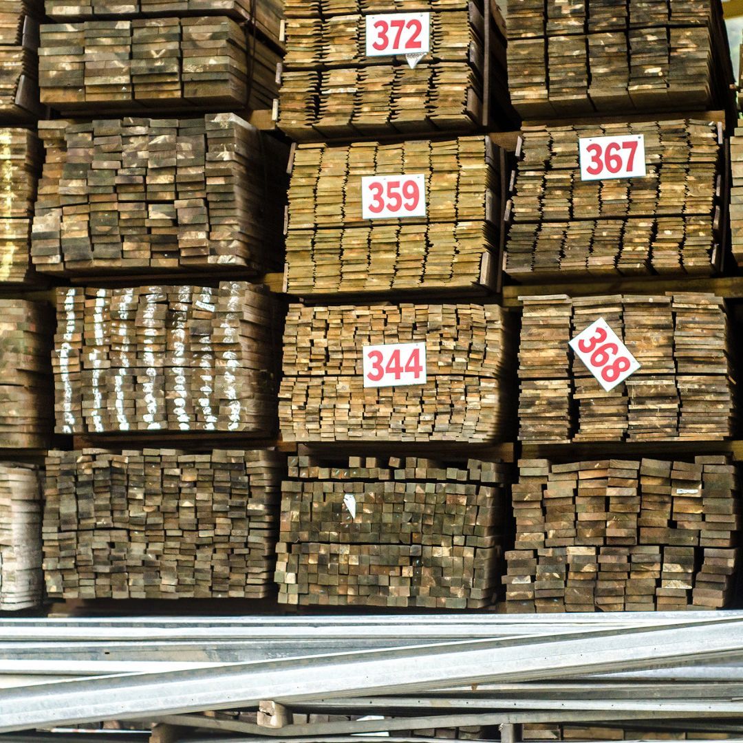 stacks of lumber in a lumber yard