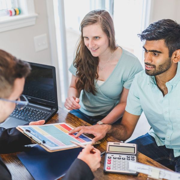 couple meeting with a travel agent