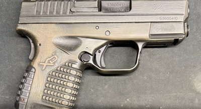 a gold tinted gun