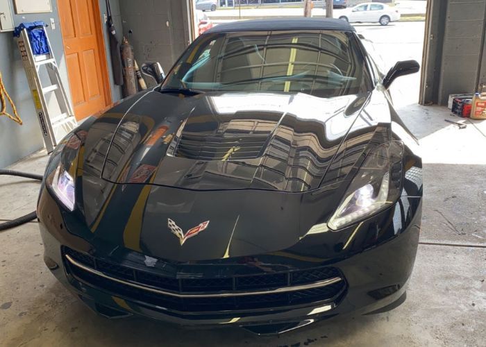 a corvette with a new windshield