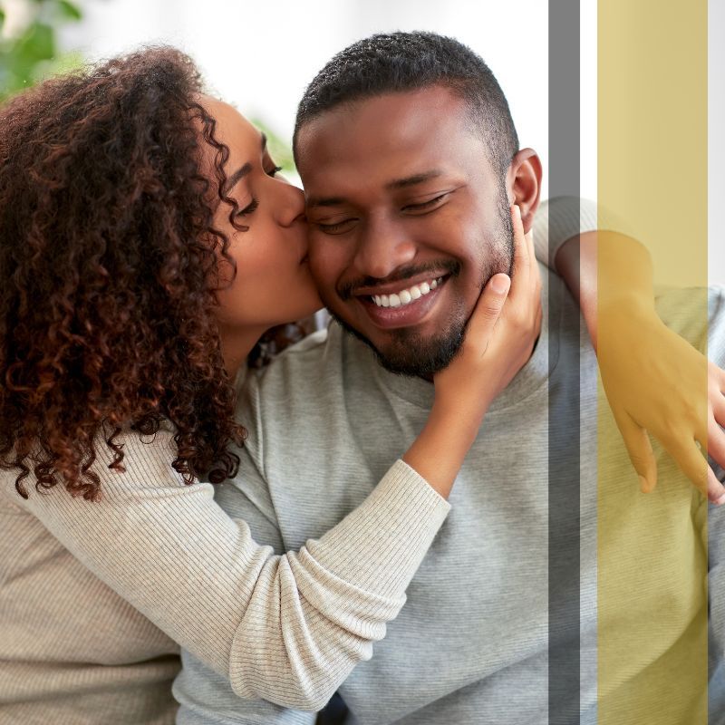 woman kissing husband's cheek