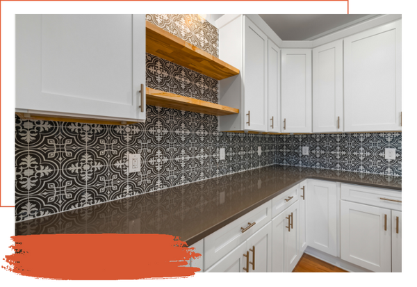 upgraded kitchen with white cabinets