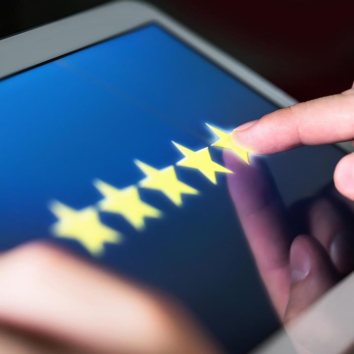 Tablet showing a 5 star review
