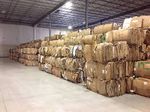 warehouse with rows of recycled cardboard cubes