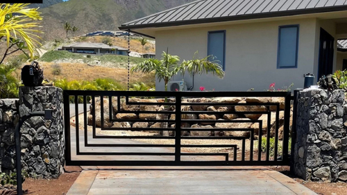 Image of a gate in front of a house