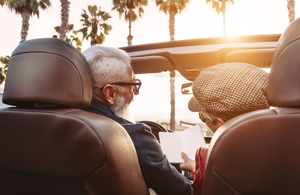 Older couple going for a drive