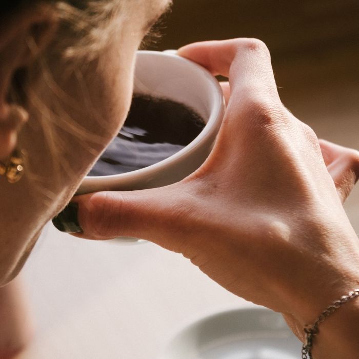 woman drinking coffee