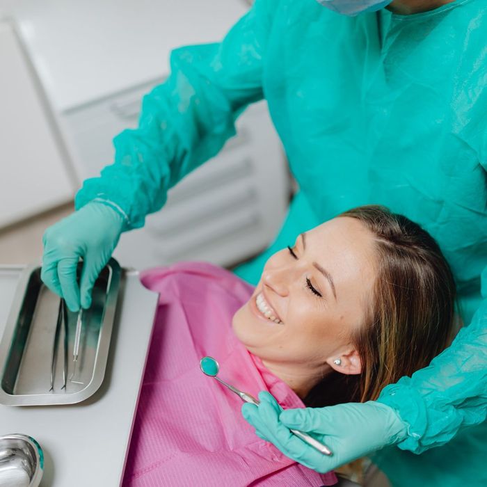 patient smiling in dental chair