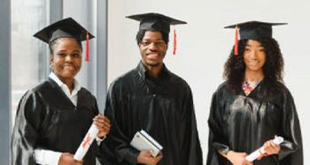 three graduates holding diplomas