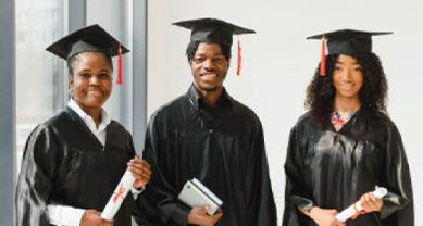 three graduates holding diplomas