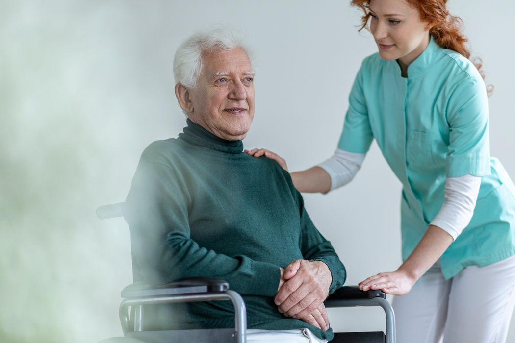 Smiling man with a nurse.jpg