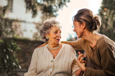 A caregiver providing companionship for seniors.