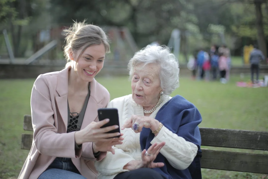 A caregiver looking after a woman with dementia.