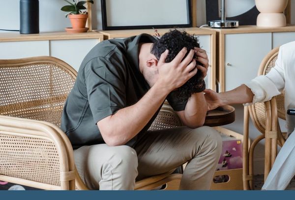 man in counseling for depression