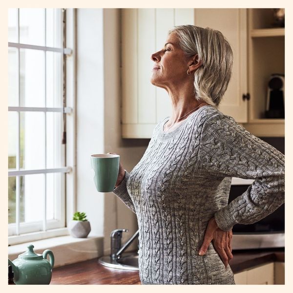 woman stretching her back