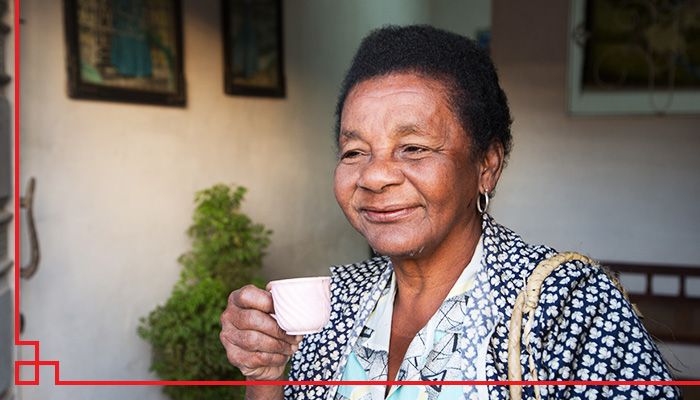 Older lady with slight smile