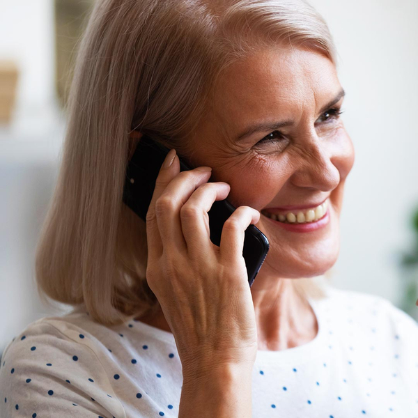 Smiling senior woman on the phone