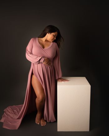 Expecting mother in mauve gown during a fine art studio maternity session by Kelly Saxon Photography, professional maternity photographer in Murfreesboro Tennessee. Studio Fine Art Maternity Photo - Kelly Saxon Photography