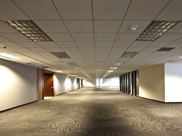 An empty building office with newly cleaned floors.