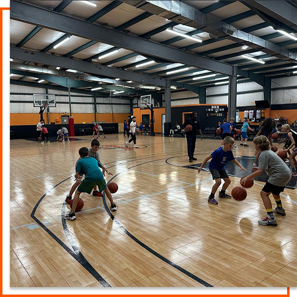 Children Playing Basketball at Hoop Dreams