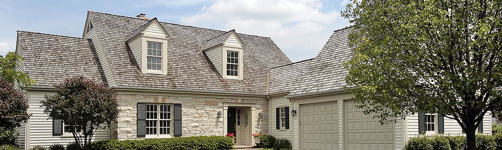 bigstock-stone-home-with-cedar-roof-7213477-crop-u6080.jpg