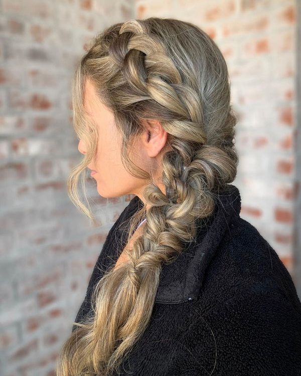 Blonde woman with long side braid