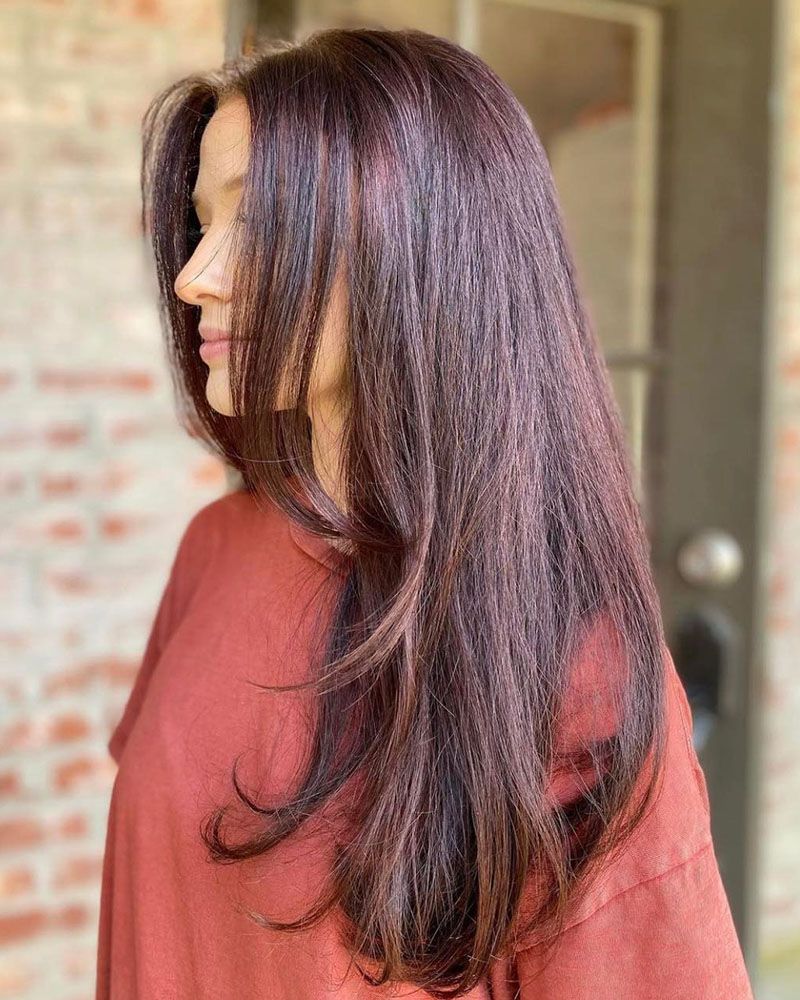 long dark brown hair with red tint